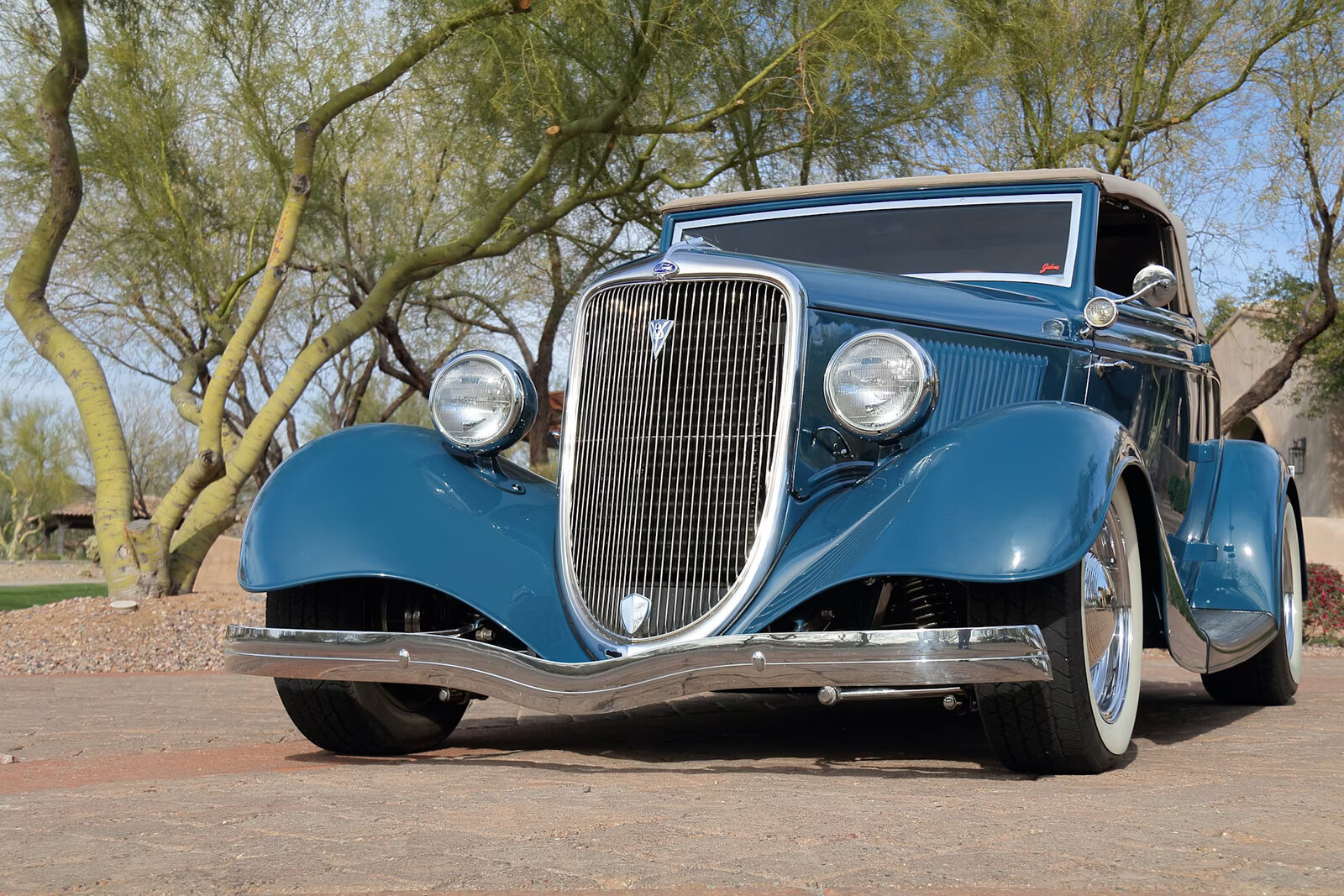 1934 Ford Deluxe Cabriolet in PPG Avon Blue, front three-quarter view