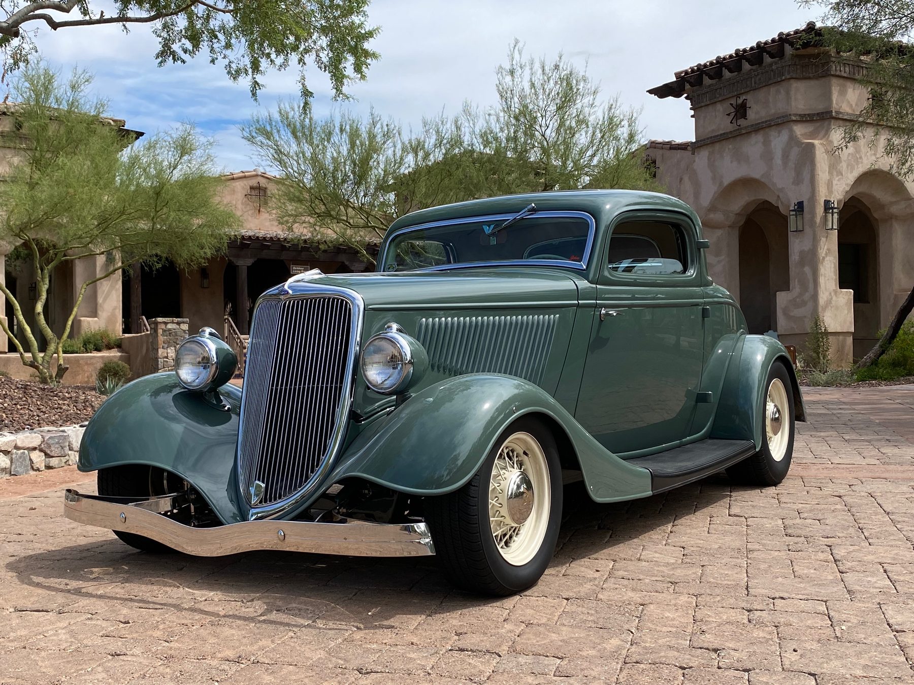 Joe Sahli's 1934 Ford three-window coupe, front three-quarter view in a Scottsdale courtyard