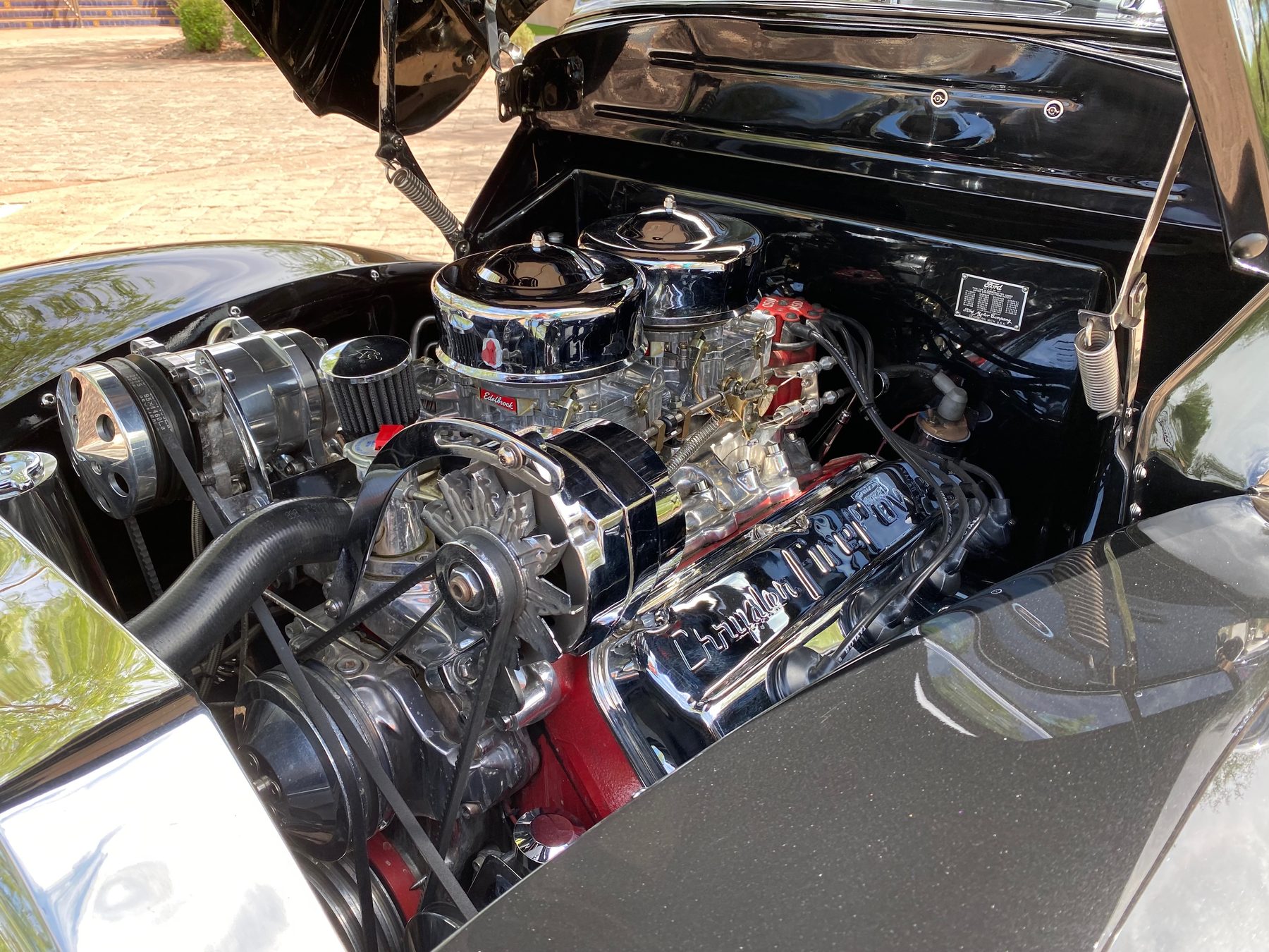Engine bay with dual Edelbrock carburetors