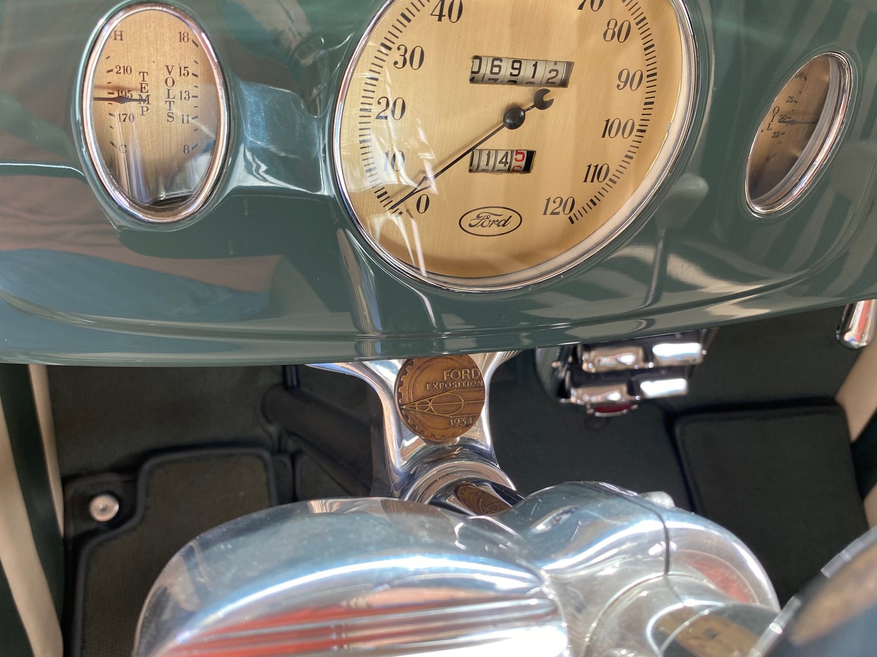 Speedometer and Ford Exposition 1934 medallion