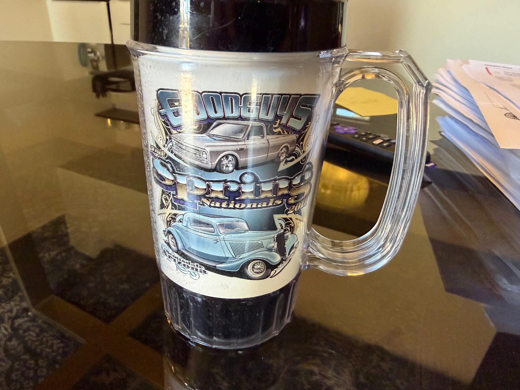 Goodguys Spring Nationals commemorative mug featuring a three-window coupe